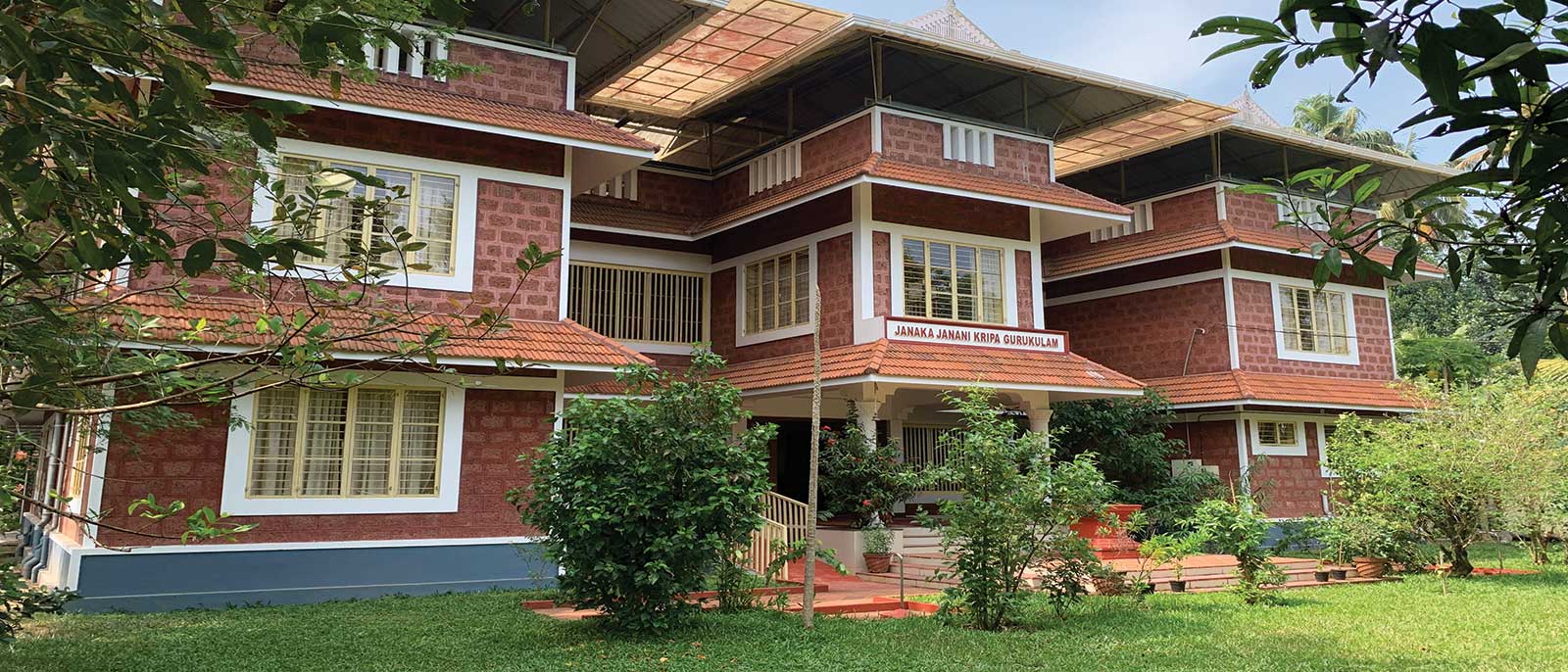 JJK Gurukulam campus surrounded by greenery