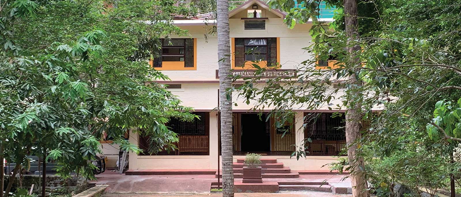 Shanti Nilayam retreat home among mature trees